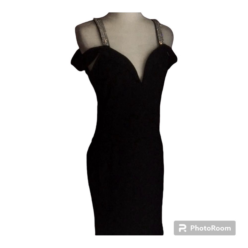 J. Our black gown